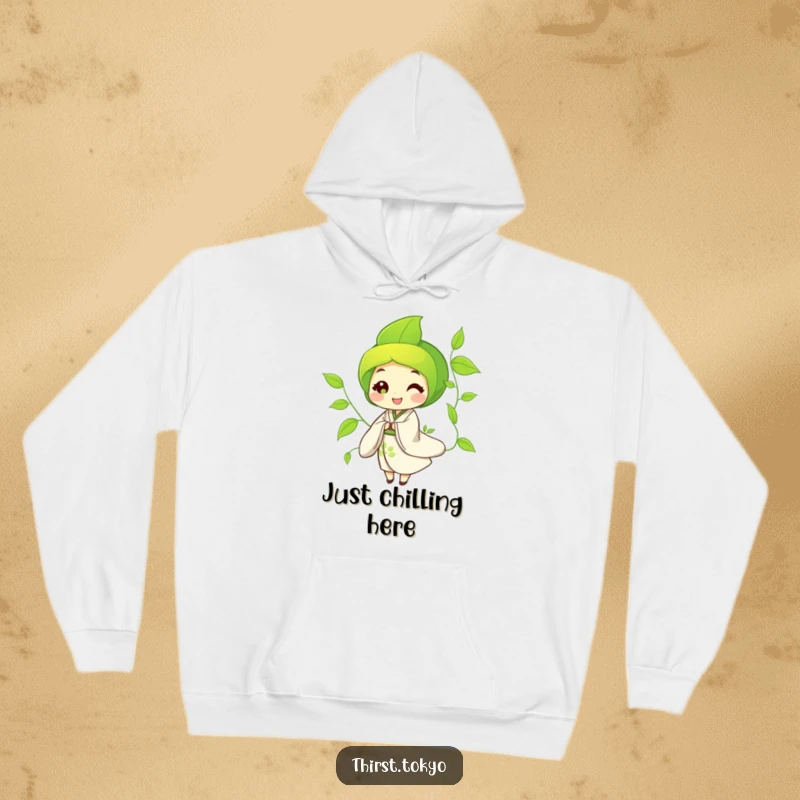Funny Hoodie with a happy green tea leaf character dressed in a flowing kimono, swaying gently, offering warmth and humor.